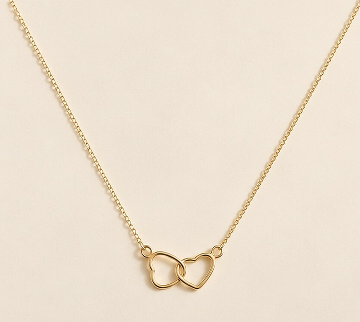 Collar doble corazón entrelazado oro, vista 1
